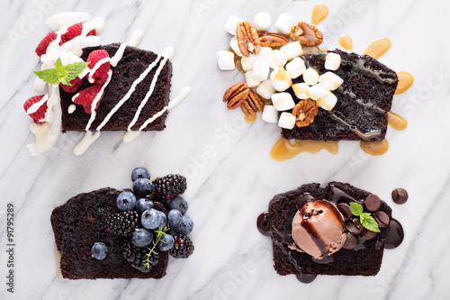 Chocolate loaf cake slices on a marble board