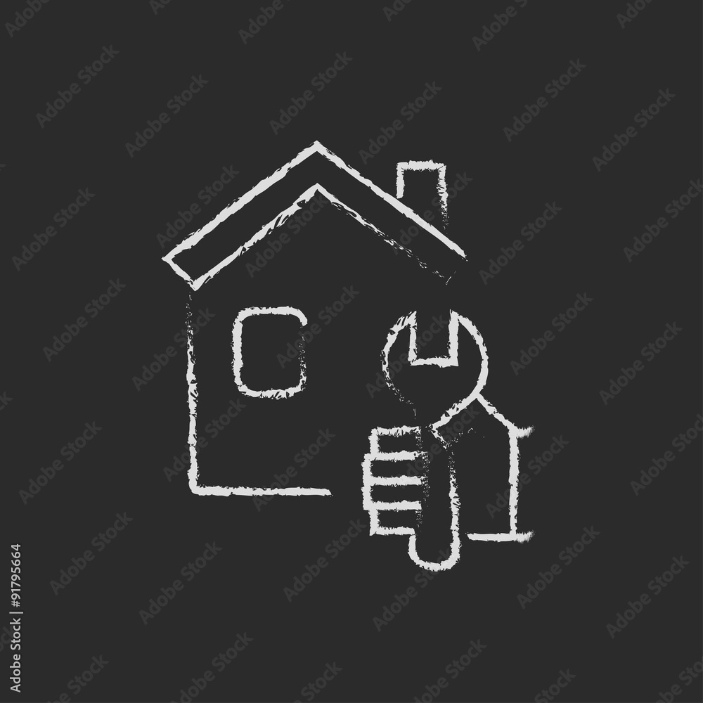 House repair icon drawn in chalk. House repair icon drawn in chalk.