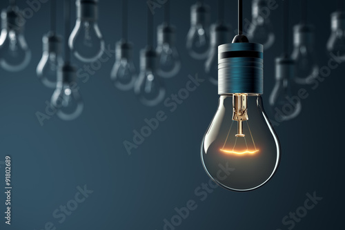 Obraz na plátne Glowing Hanging Light Bulb