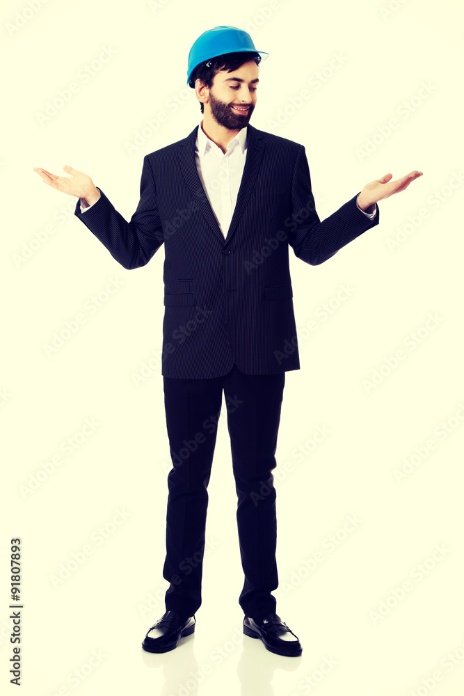 Businessman showing empty copyspace in hands. Businessman showing empty copyspace in hands.