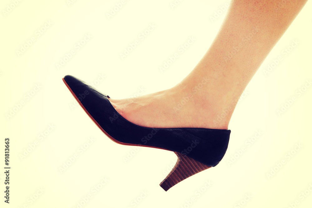Sexy female leg in classical shoes. Sexy female leg in classical shoes.