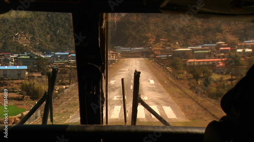 Cockpit view of plane landing at Lukla photo