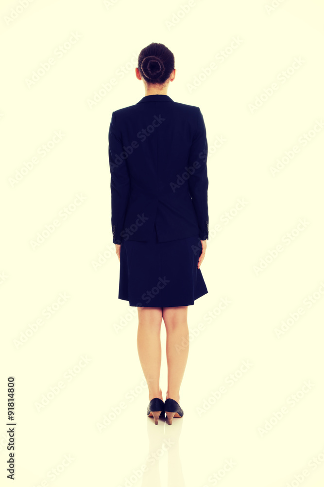 Fototapeta premium Businesswoman standing back to camera.