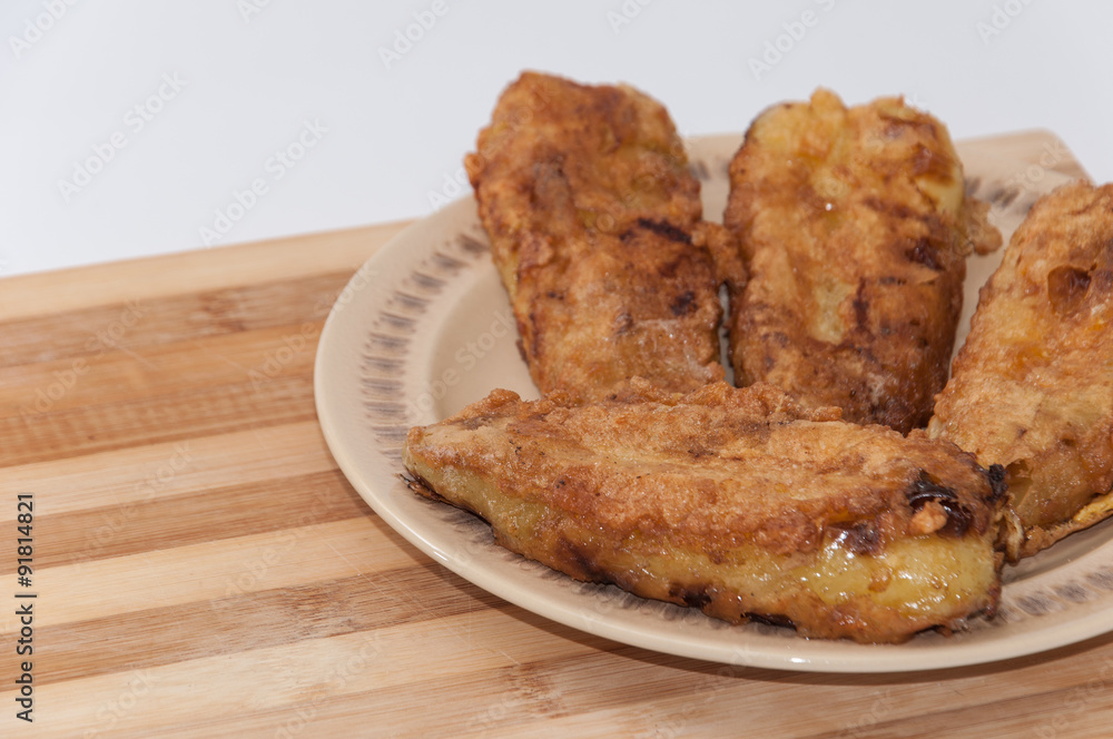 Fried paprika stuffed with cheese and served Fried paprika stuffed with cheese and served