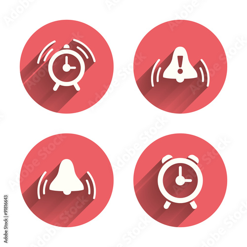 Alarm clock icons. Wake up bell signs symbols.