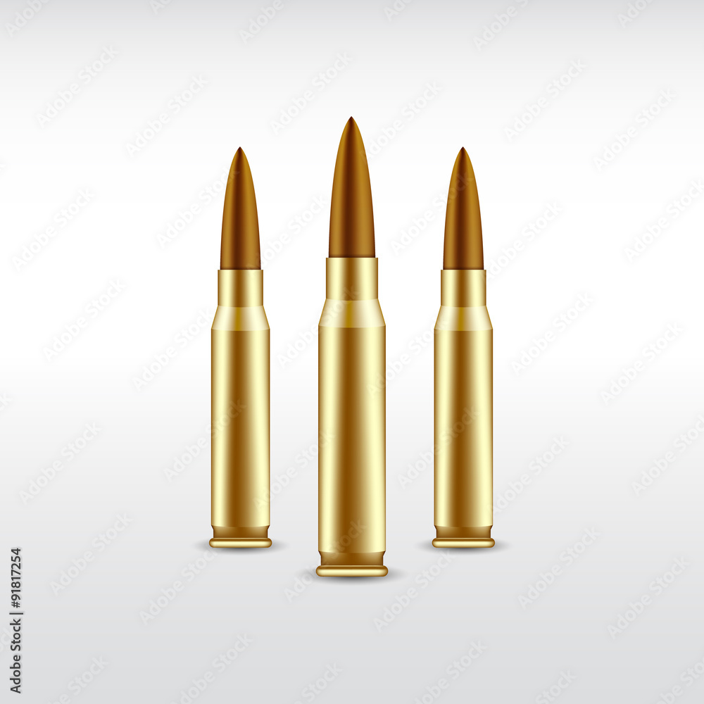 Three realistic bullets on light background Three realistic bullets on light background