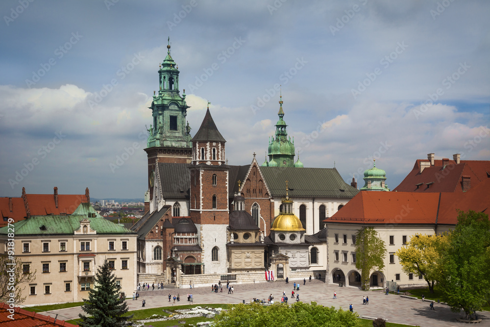 Krakow Wawel castle towers roof view with tourists, Poland,