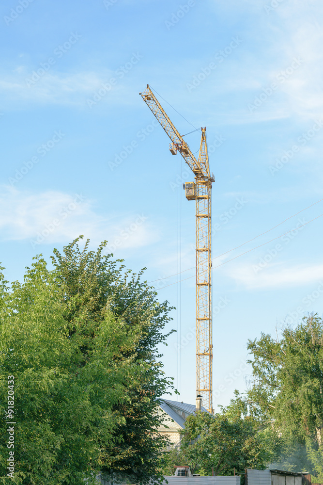 One tower crane on the construction of new apartment house