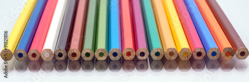 The colored pencils on a white background