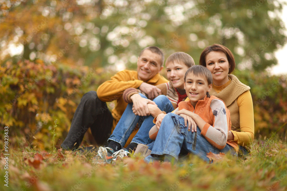 Happy family in autumn forest Happy family in autumn forest