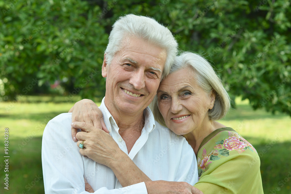 Mature couple on  in summer park