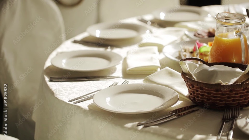A soft toned image of a table setting with plate, napkin A soft toned image of a table setting with plate, napkin