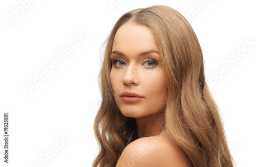 beautiful woman face with long blond hair