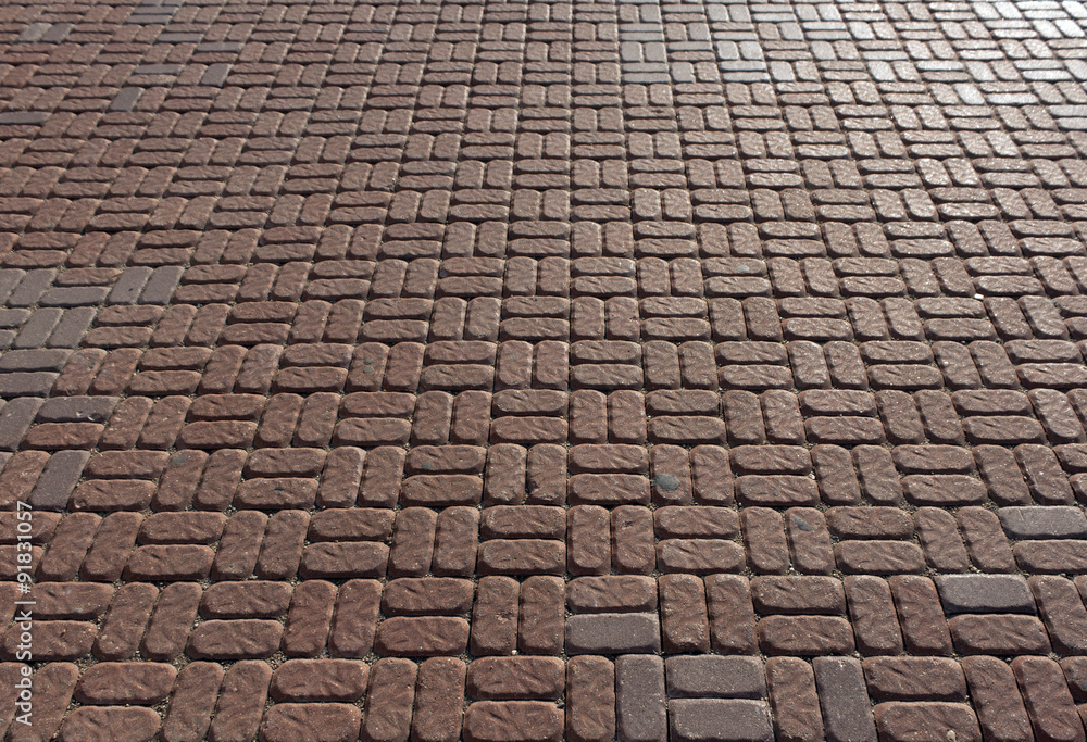 Red and grey pavement texture.