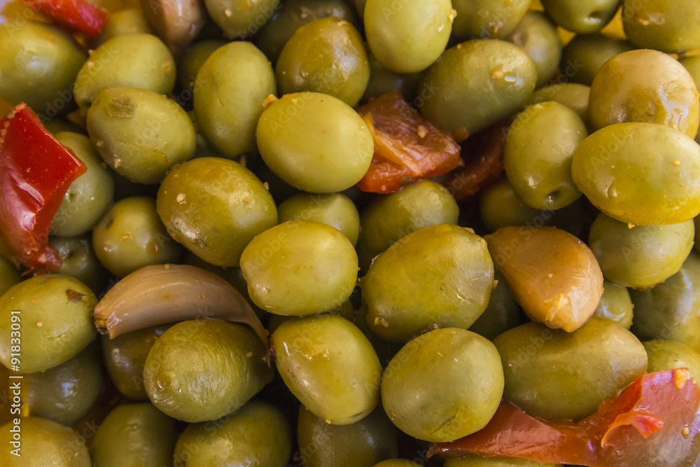 Olives marinated with garlic and peppers Olives marinated with garlic and peppers