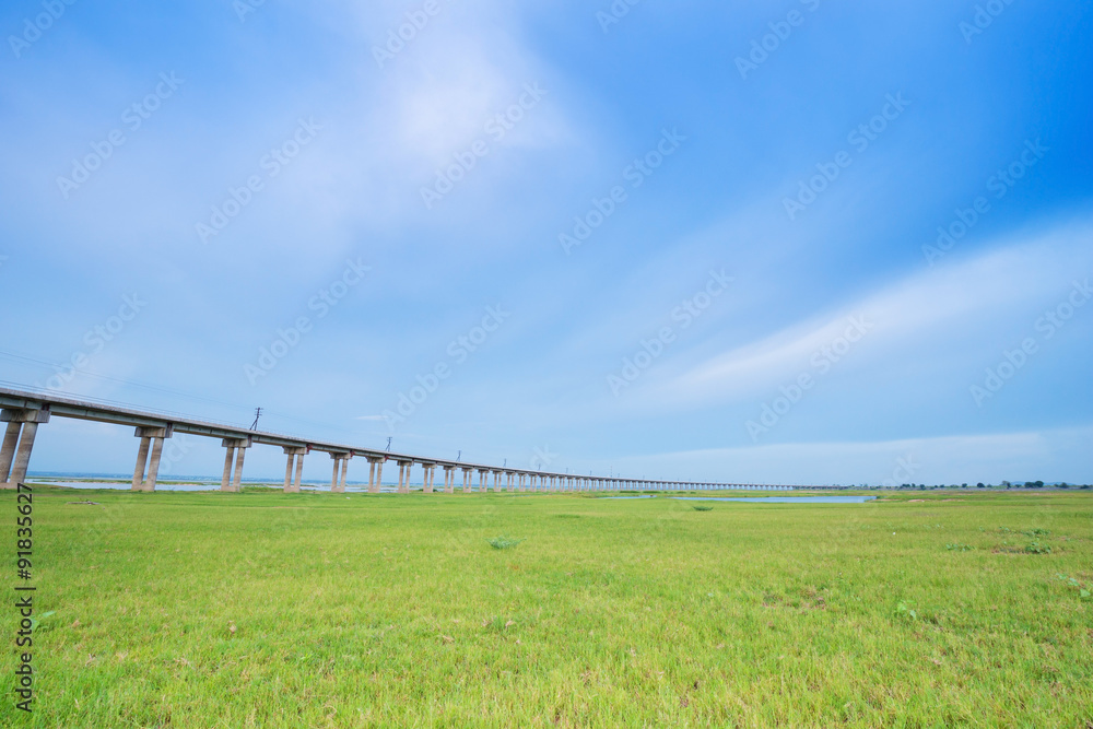Bridge of railway cross grass field meadow
