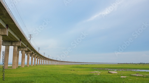 Bridge of railway cross grass field meadow