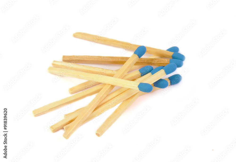 Matches with blue head isolated on a white background