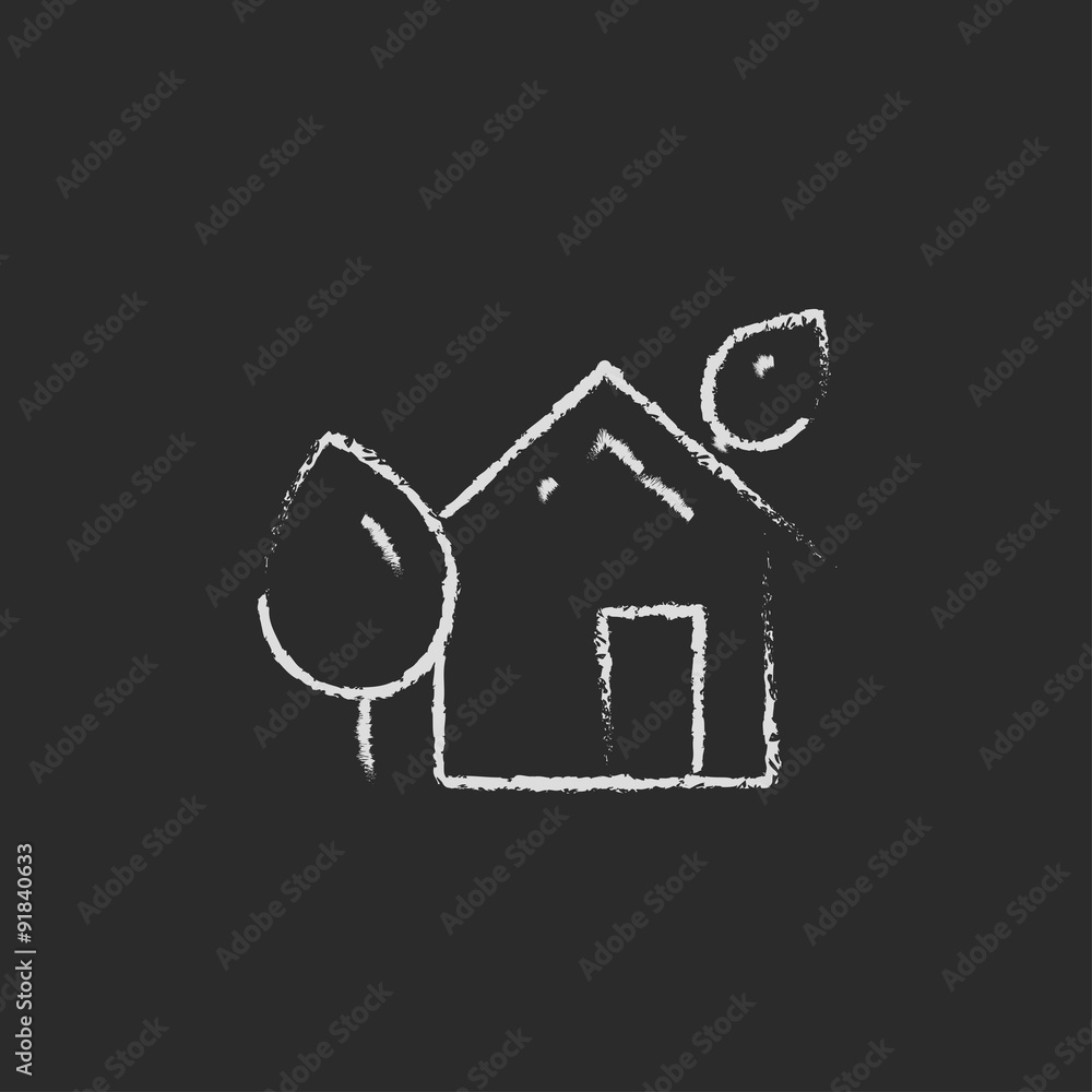 Eco-friendly house icon drawn in chalk.