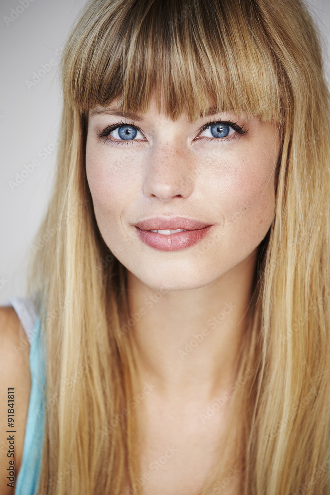 Portrait of beautiful blond woman, smiling Portrait of beautiful blond woman, smiling