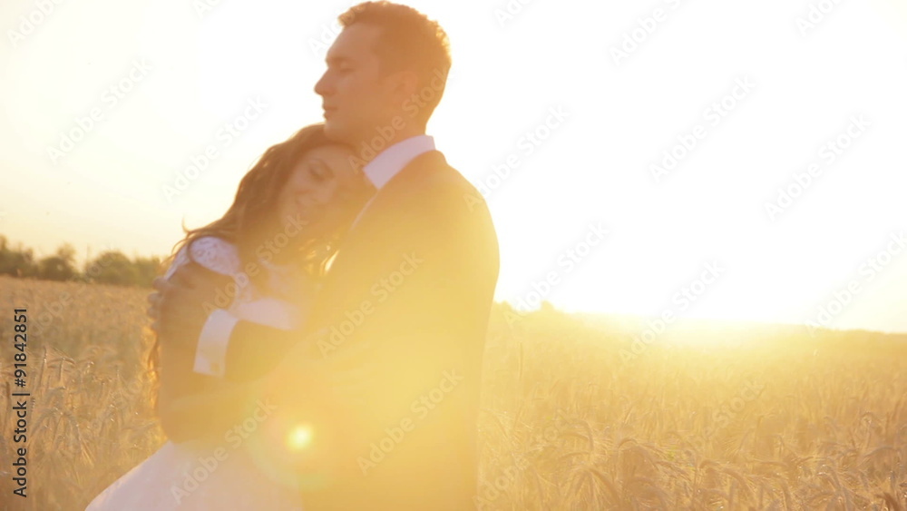 Beautiful young couple bride and groom in a wedding dress at Beautiful young couple bride and groom in a wedding dress at