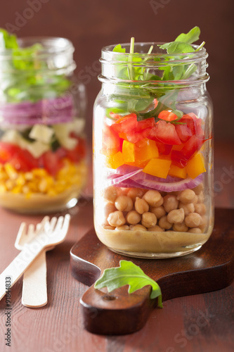 healthy vegetable chickpea salad in mason jar