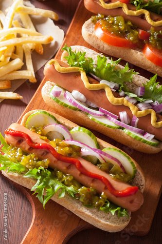 grilled hot dogs with vegetables ketchup mustard