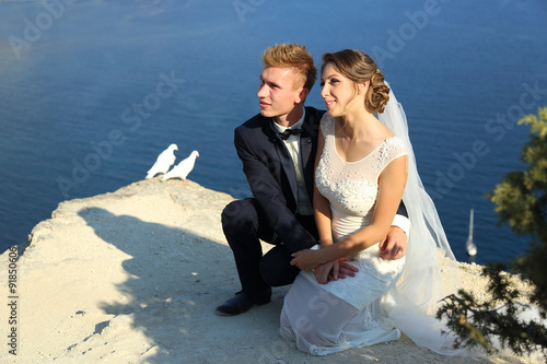 Wedding couple with pigeons 