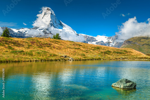 Famous Matterhorn peak and Leisee alpine glacier lake,Valais,Switzerland photo