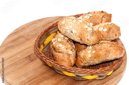Rolls with integral flour and grain in a basket