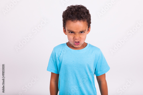 Canvas Print Portrait of a angry little African American boy