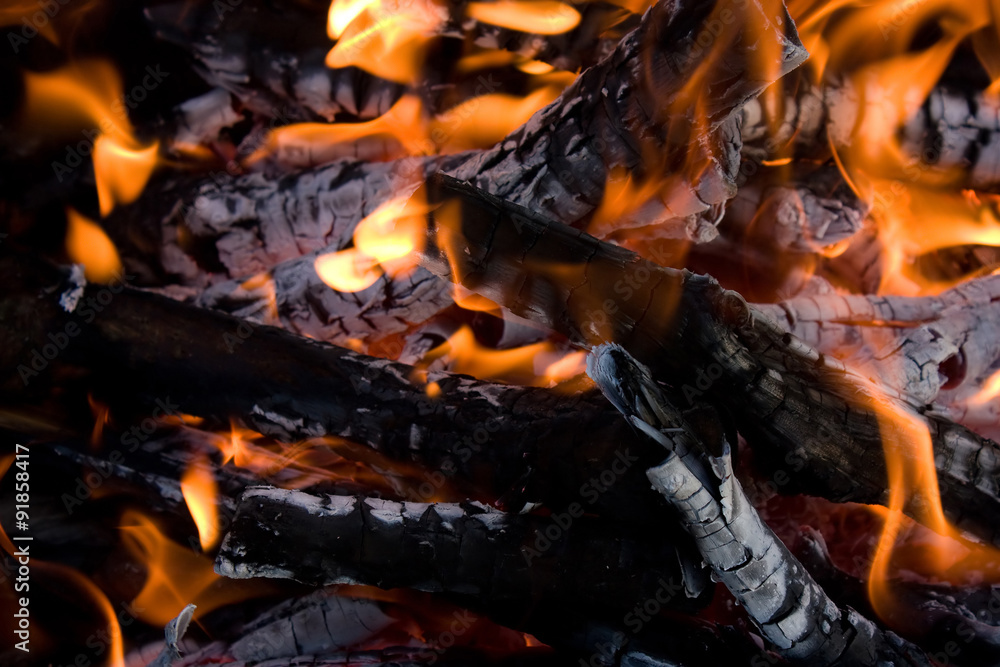 Camping bonfire fragment close-up view in dark Camping bonfire fragment close-up view in dark