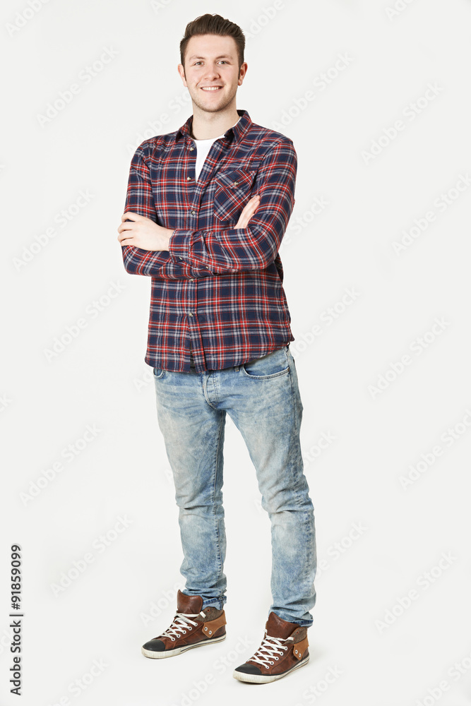 Portrait Of Man Standing In Studio On White Background Portrait Of Man Standing In Studio On White Background