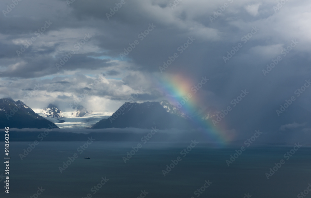 Rainbow in front of glacier