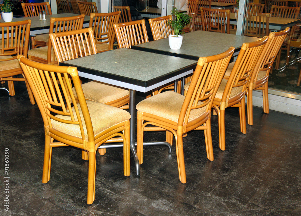 glass table and wooden chairs