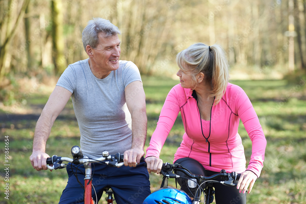Obraz premium Mature Couple On Cycle Ride In Countryside Together
