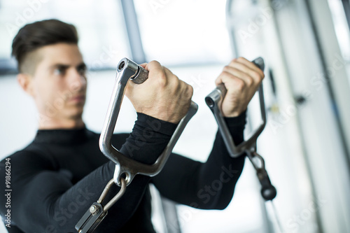 Young man training in the gym