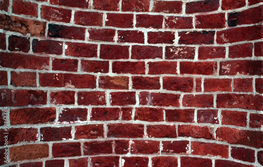 Obraz premium Oval old red brick wall