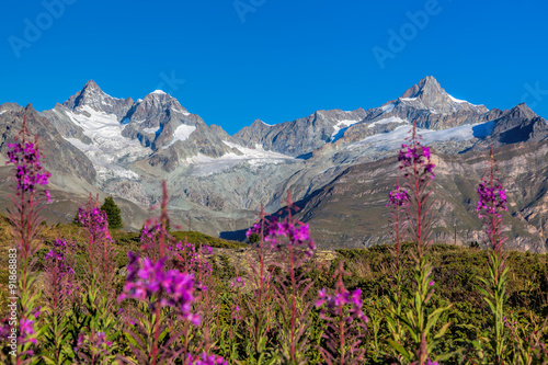 Swiss Alps with glaciers against blue sky, Matterhorn area, Zermatt