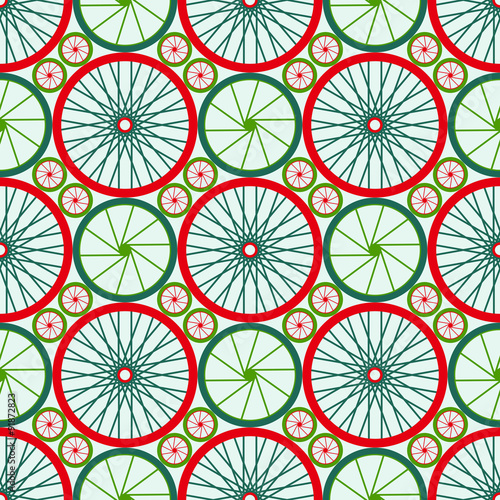 Seamless pattern with bike wheels. Bicycle wheels with colored rims and spokes. Vector illustration. 