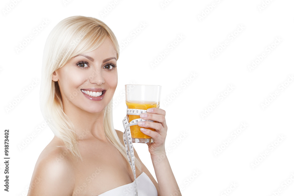 Young woman with glass of orange juice. Female model happy smile Young woman with glass of orange juice. Female model happy smile