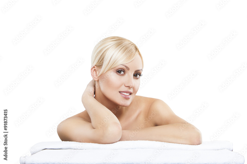 picture of woman in spa salon lying on the massage desk picture of woman in spa salon lying on the massage desk