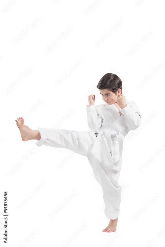 Boy in a kimono practicing martial arts and jiu jitsu Boy in a kimono practicing martial arts and jiu jitsu