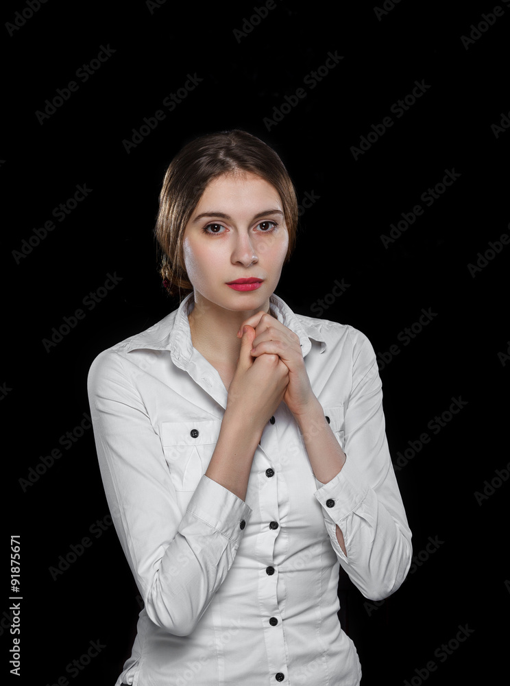 Young casual woman isolated over black background Young casual woman isolated over black background