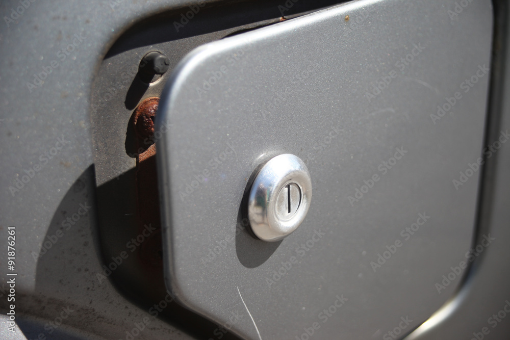 Broken gas tank cover that is scratched Broken gas tank cover that is scratched