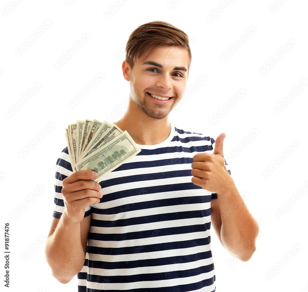 Handsome young man holding money isolated on white Handsome young man holding money isolated on white