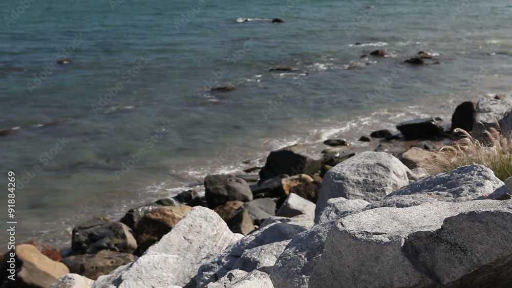 Wild stone shore or coast with waves of the Pacific ocean on Wild stone shore or coast with waves of the Pacific ocean on