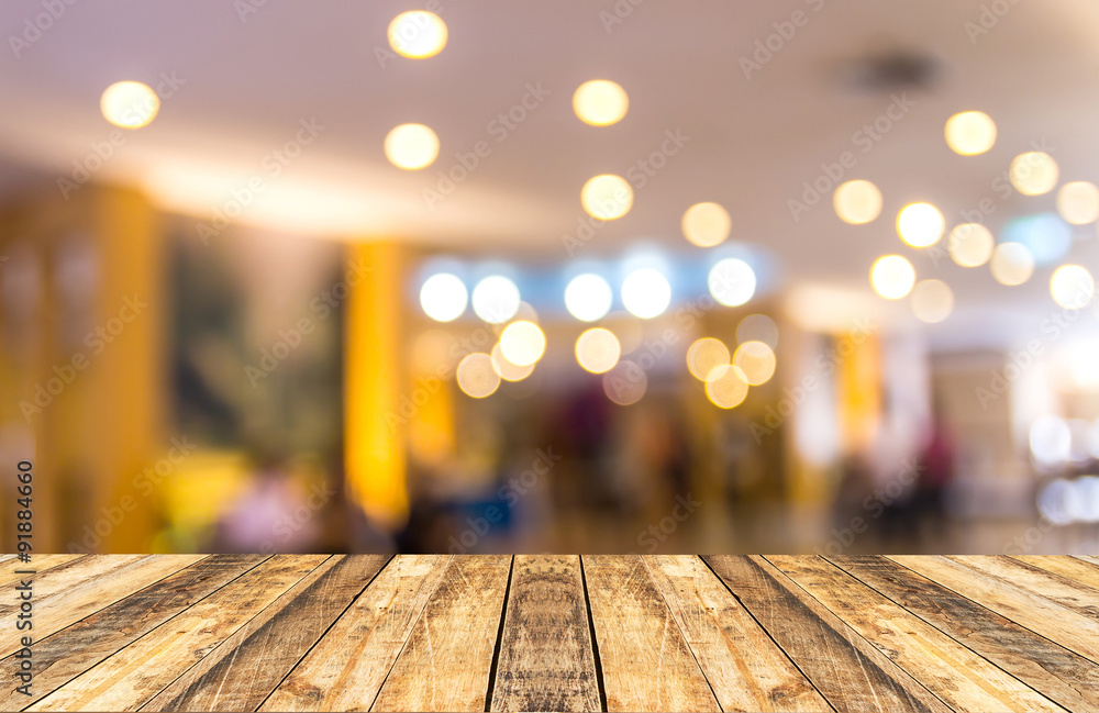 Old wooden table with blurred hotel lobby background Stock Photo | Adobe  Stock