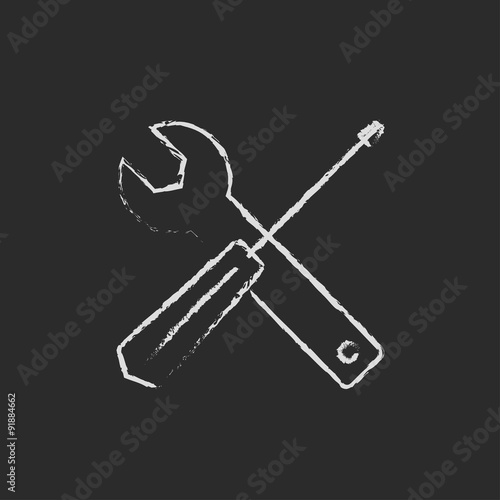 Screwdriver and wrench tools icon drawn in chalk. © Visual Generation