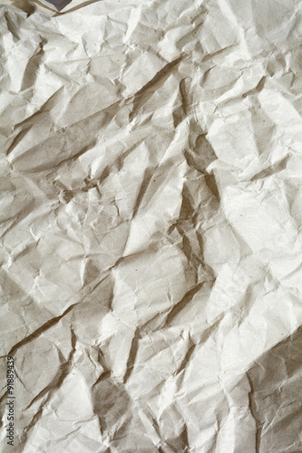 White crumpled paper for background. Brown and yellow textured grunge surface for design.